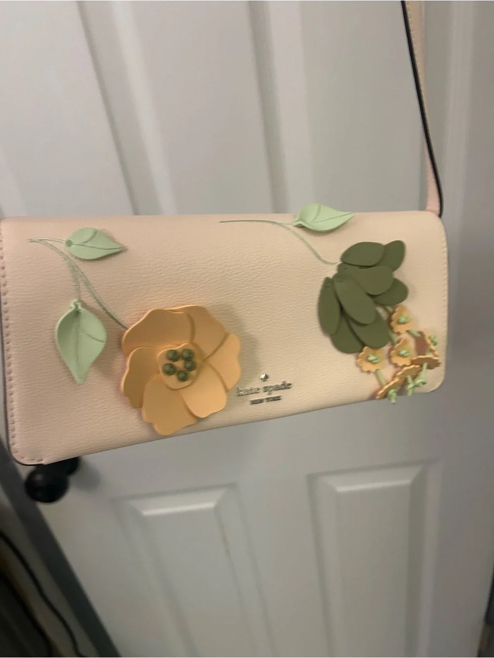 NWOT KATE SPADE floral appliqué leather crossbody bag.